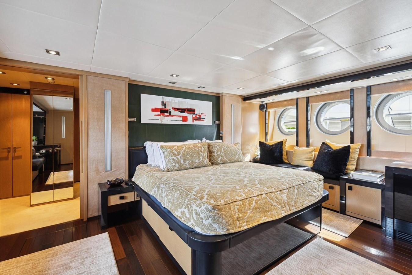a bed in a room aboard IZUMI Yacht for Sale