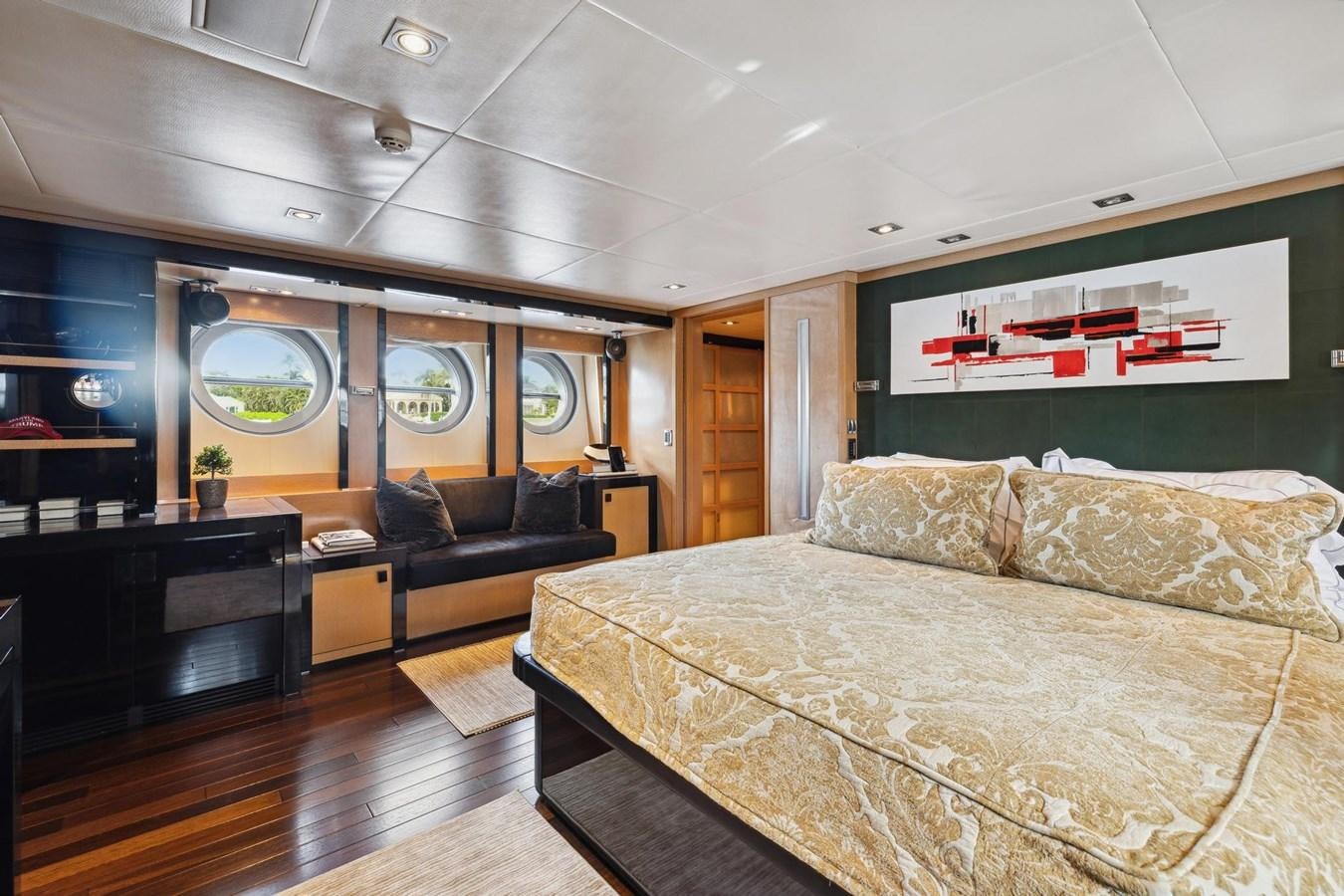 a large bed in a room aboard IZUMI Yacht for Sale