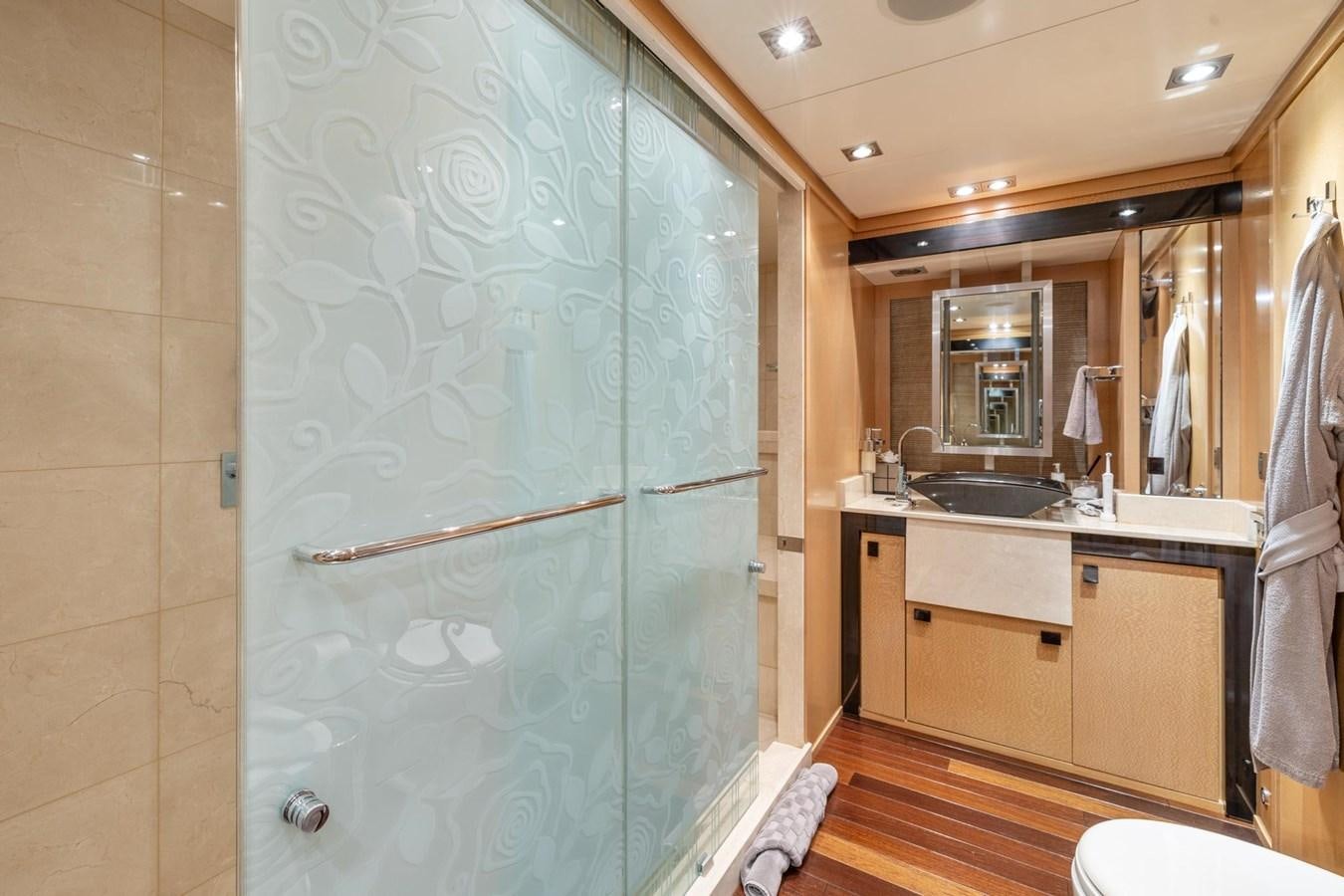 a bathroom with a shower aboard IZUMI Yacht for Sale