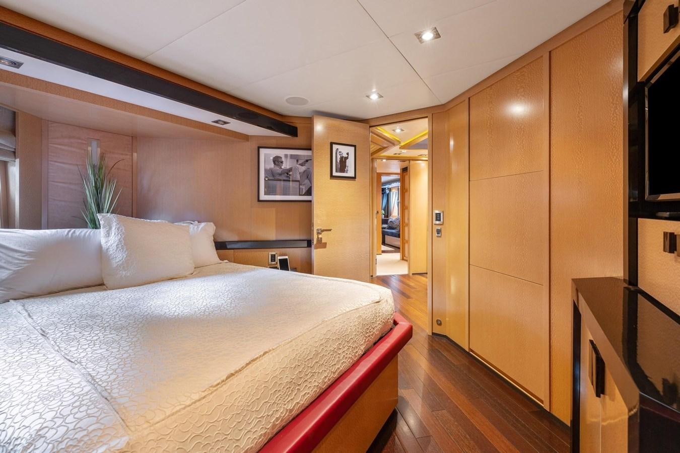 a bed in a room aboard IZUMI Yacht for Sale