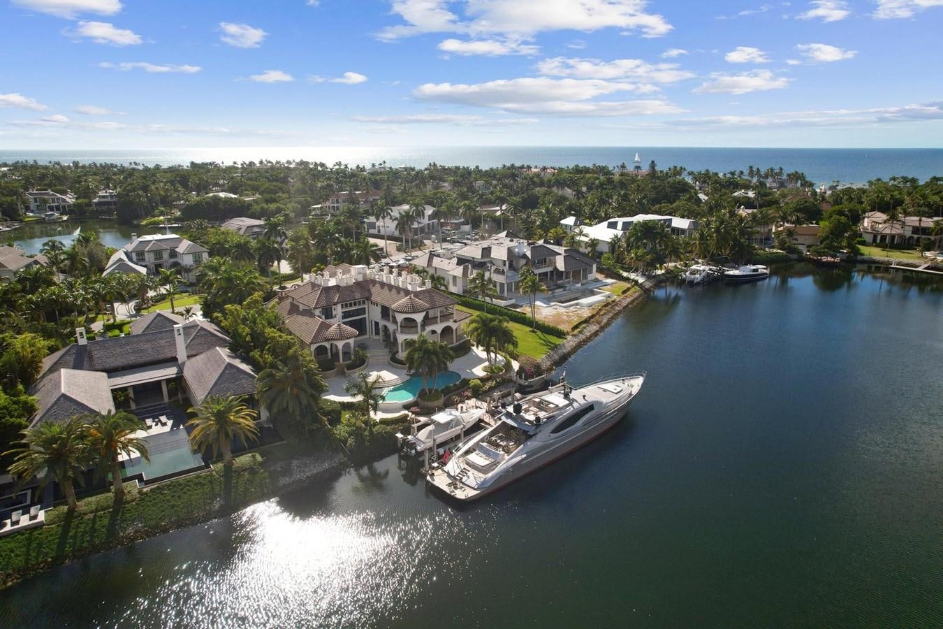 a body of water with houses along it aboard IZUMI Yacht for Sale