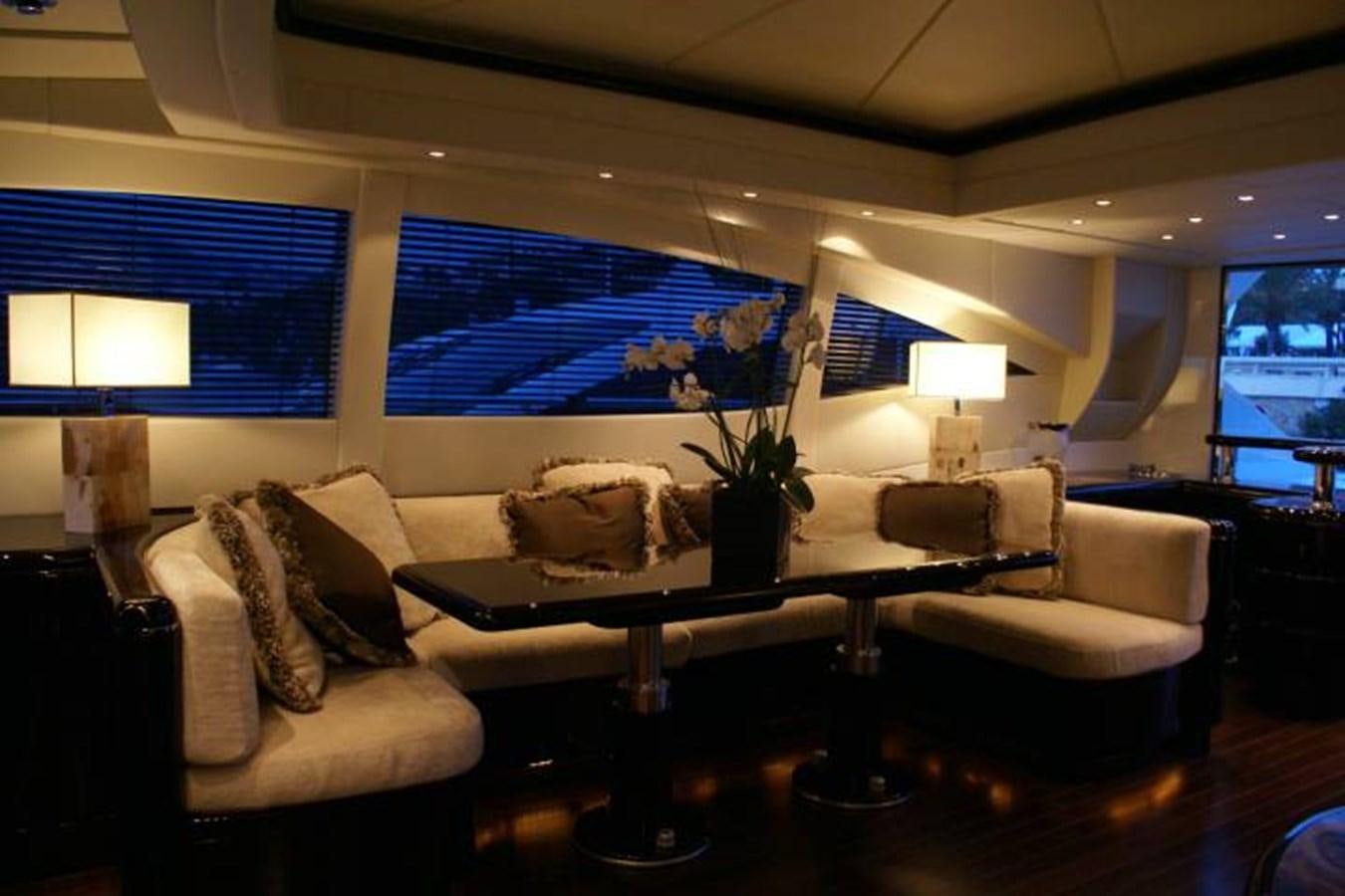 a living room with a large window aboard ENZO Yacht for Sale