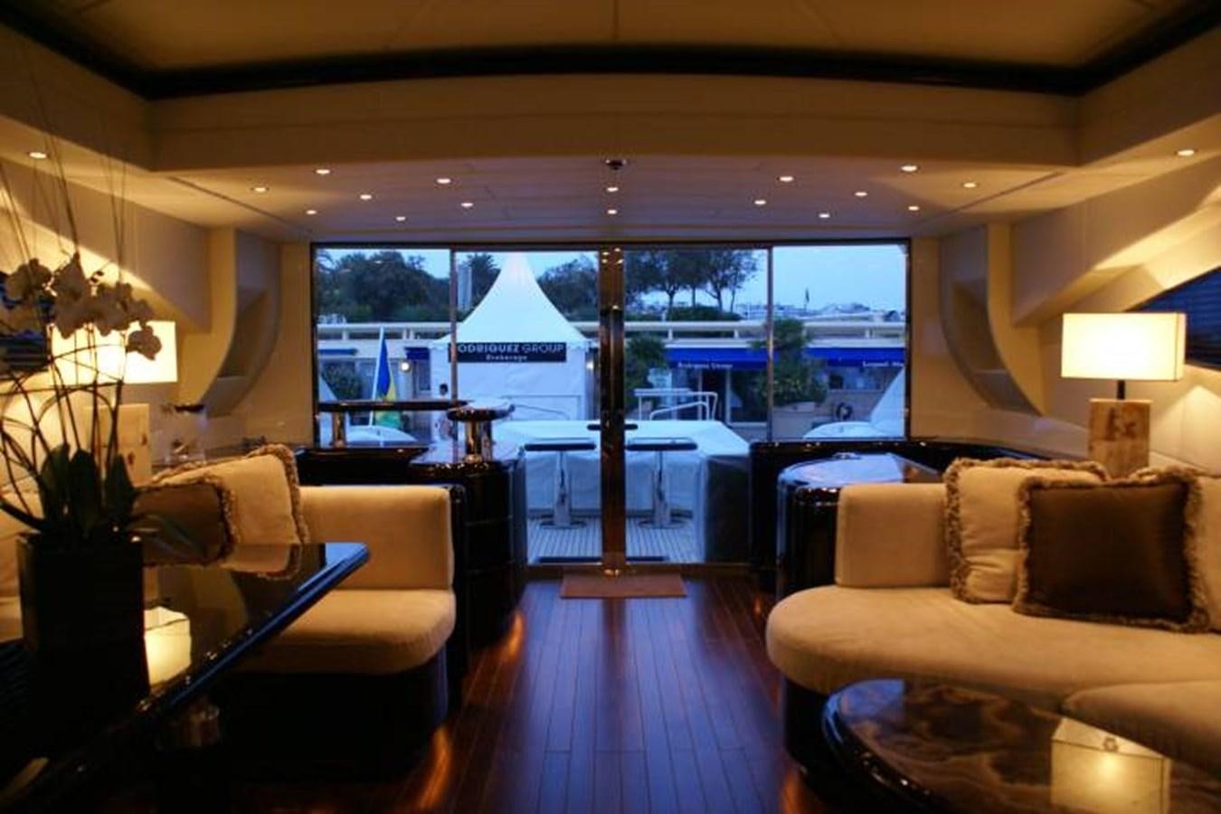 a living room with a large window aboard ENZO Yacht for Sale