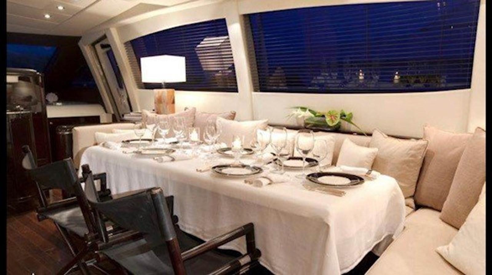 a table set for a dinner aboard ENZO Yacht for Sale