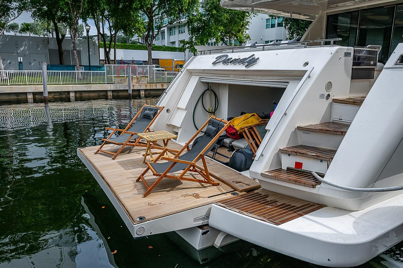 a boat docked at a pier aboard DANDY 2021 FERRETTI 850 @ AVENTURA Yacht for Sale