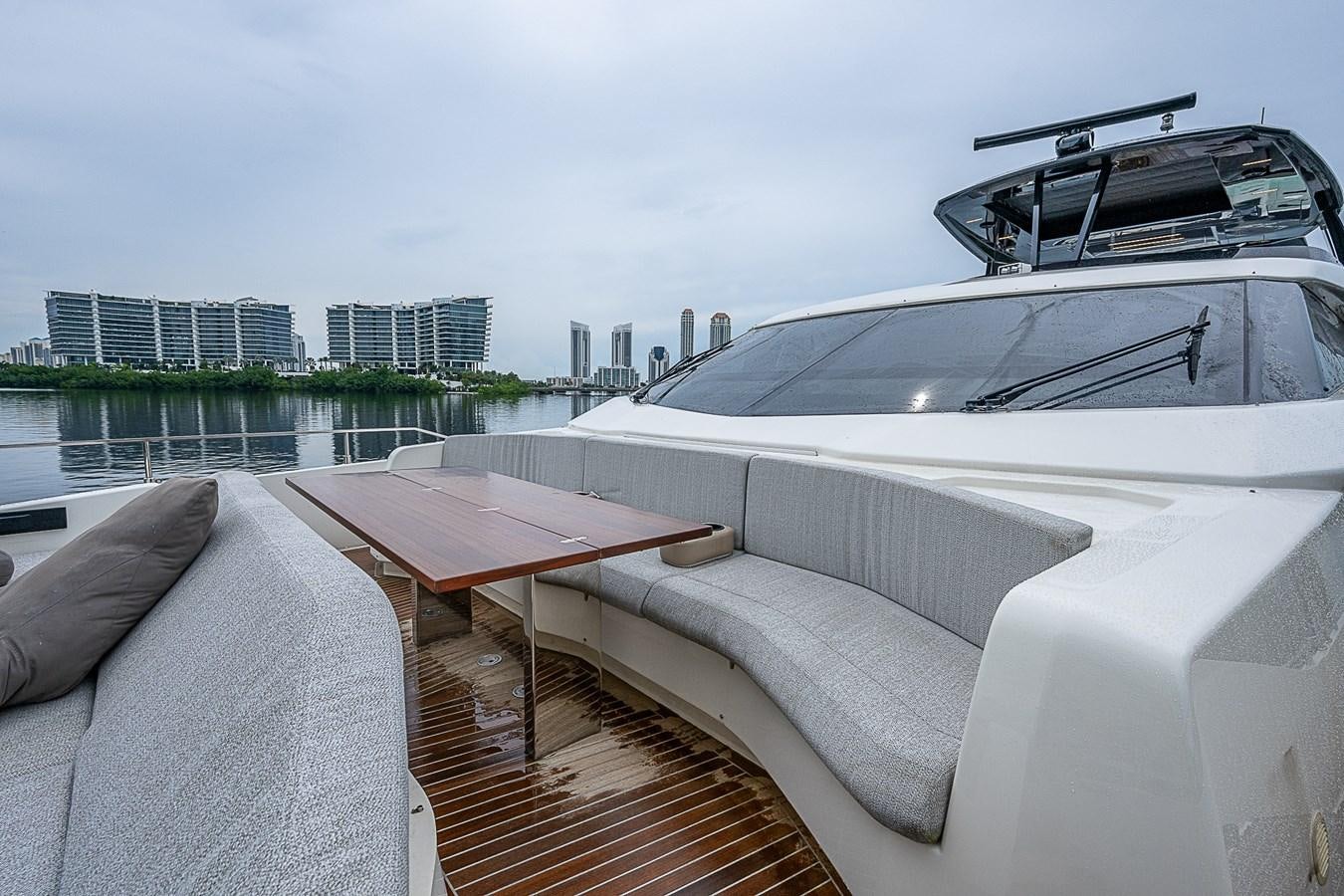 a white car on a road aboard DANDY 2021 FERRETTI 850 @ AVENTURA Yacht for Sale