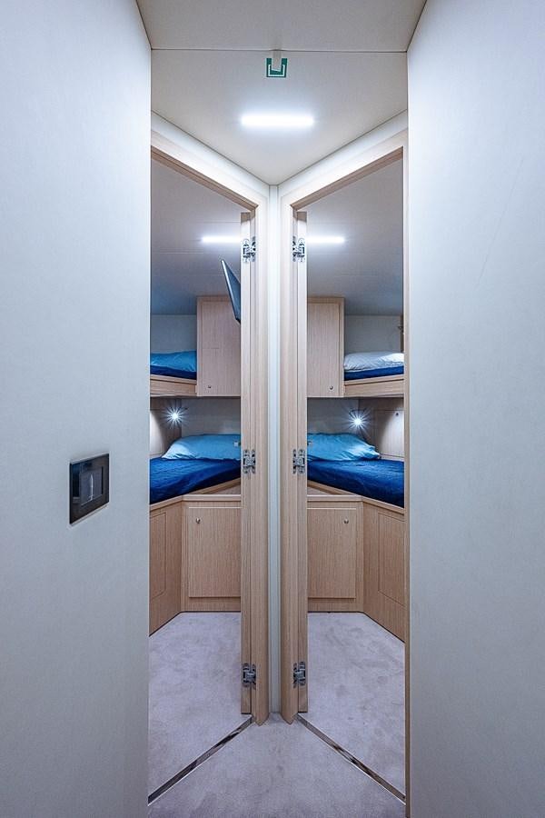 a room with bunk beds aboard DANDY 2021 FERRETTI 850 @ AVENTURA Yacht for Sale