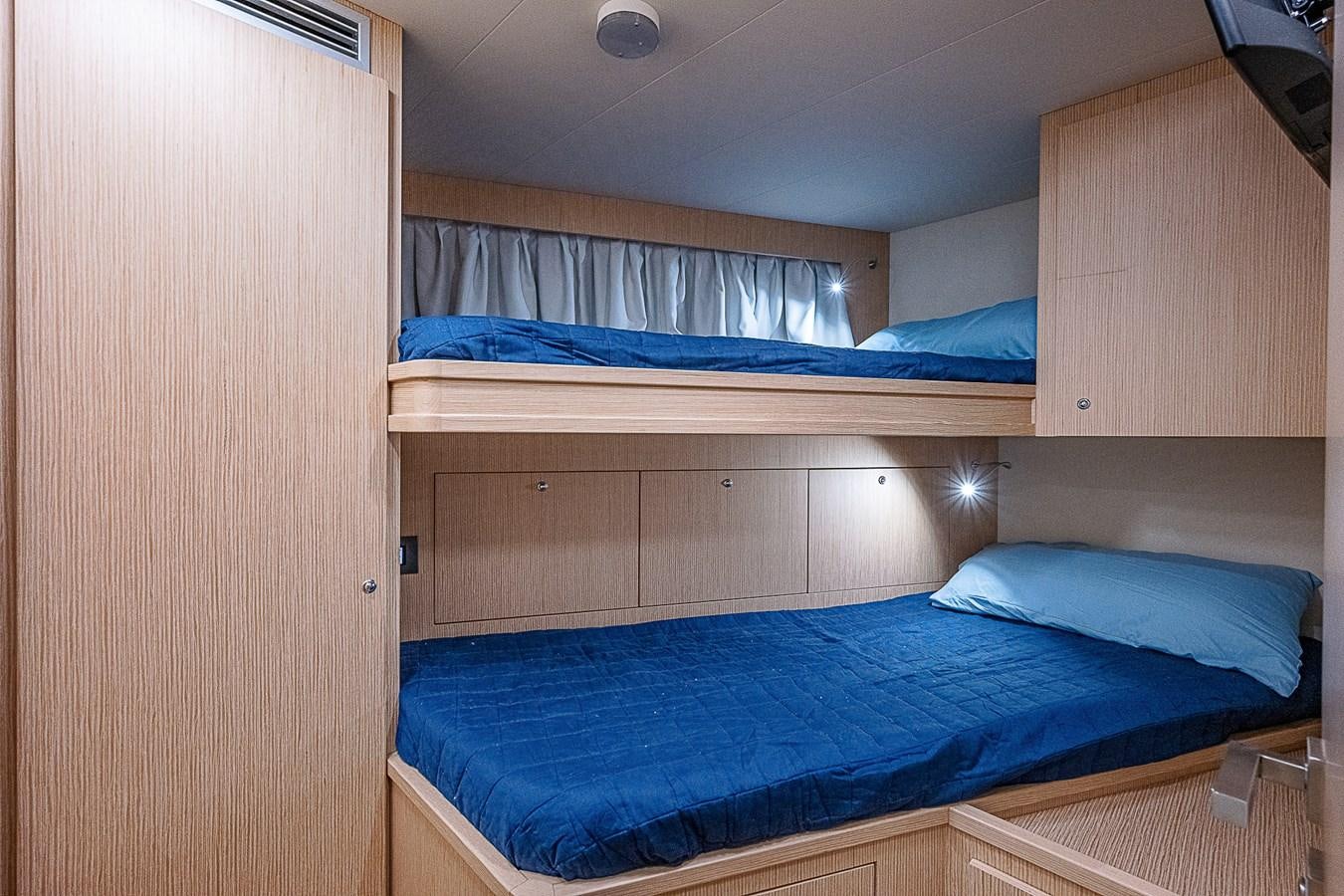 a bed in a room aboard DANDY 2021 FERRETTI 850 @ AVENTURA Yacht for Sale