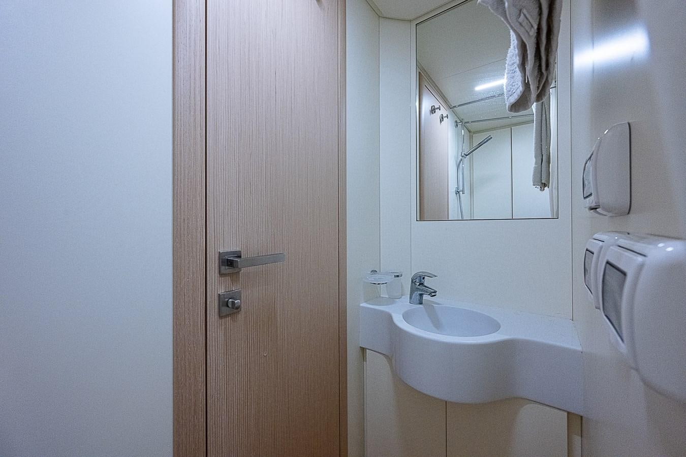 a bathroom with a sink and a toilet aboard DANDY 2021 FERRETTI 850 @ AVENTURA Yacht for Sale