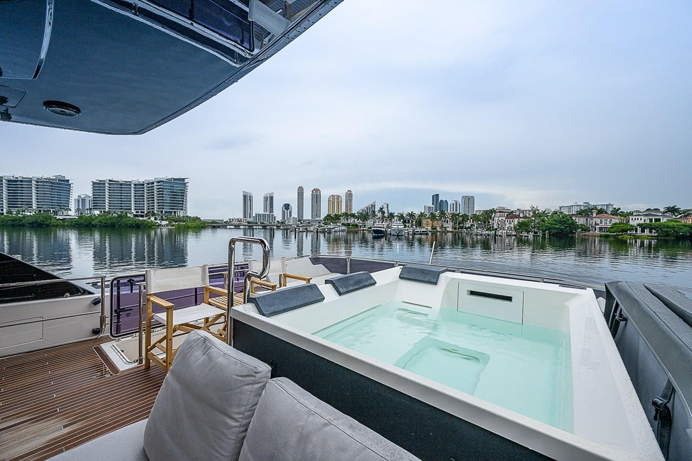 a large balcony overlooking a city aboard DANDY 2021 FERRETTI 850 @ AVENTURA Yacht for Sale