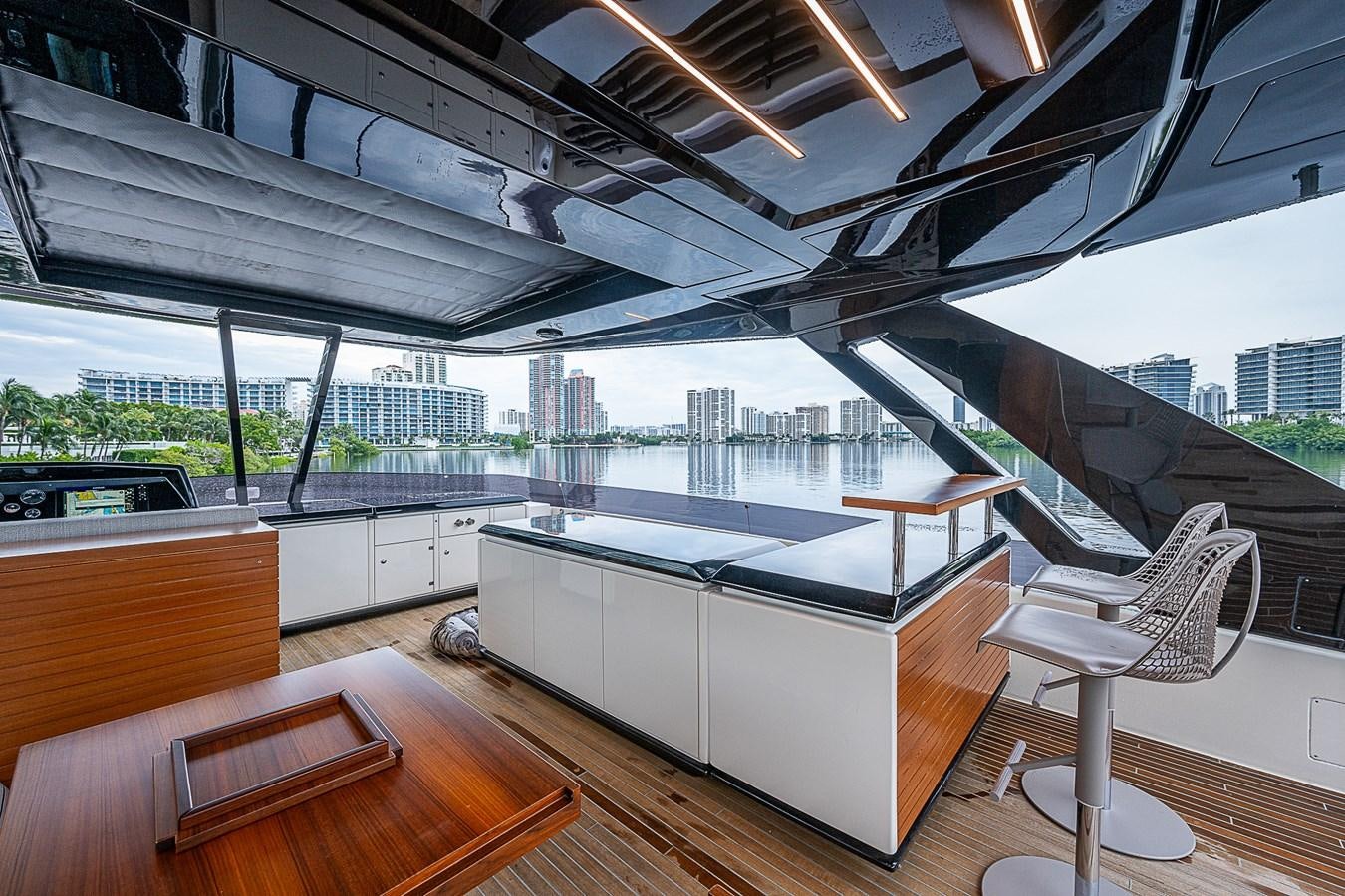 a room with a table and chairs aboard DANDY 2021 FERRETTI 850 @ AVENTURA Yacht for Sale