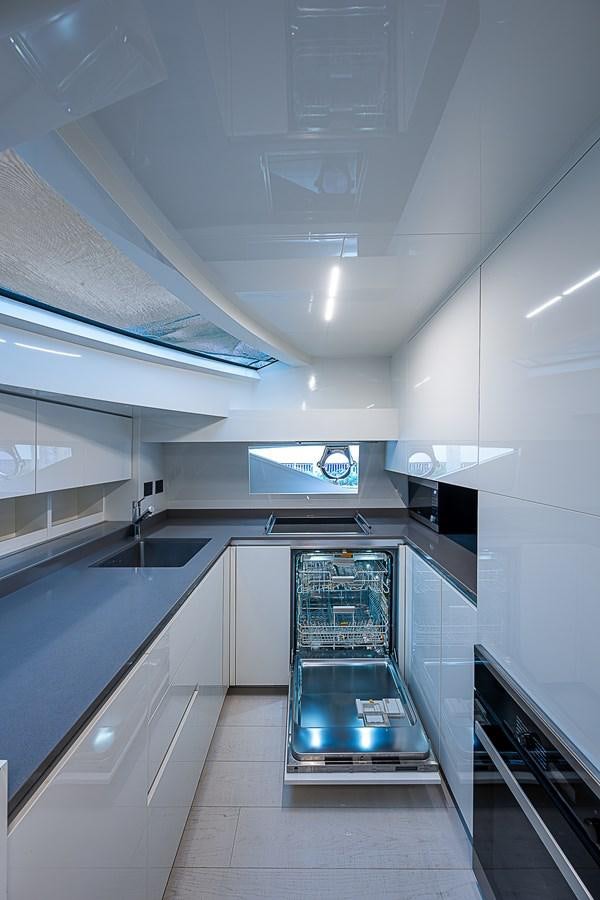 a modern looking kitchen aboard DANDY 2021 FERRETTI 850 @ AVENTURA Yacht for Sale