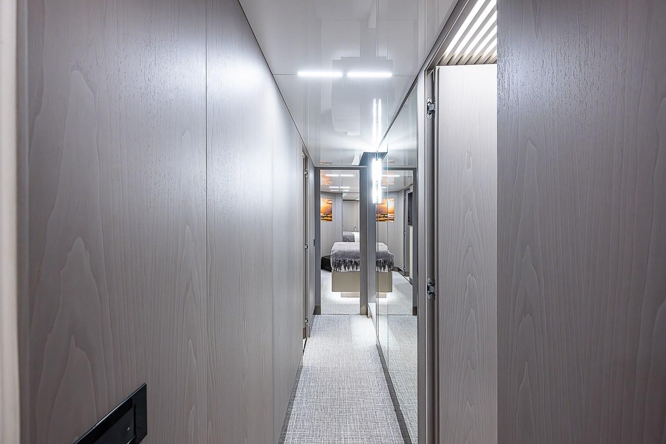 a hallway with doors aboard DANDY 2021 FERRETTI 850 @ AVENTURA Yacht for Sale