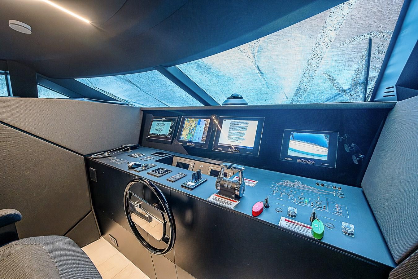 a room with many monitors and a large fan aboard DANDY 2021 FERRETTI 850 @ AVENTURA Yacht for Sale