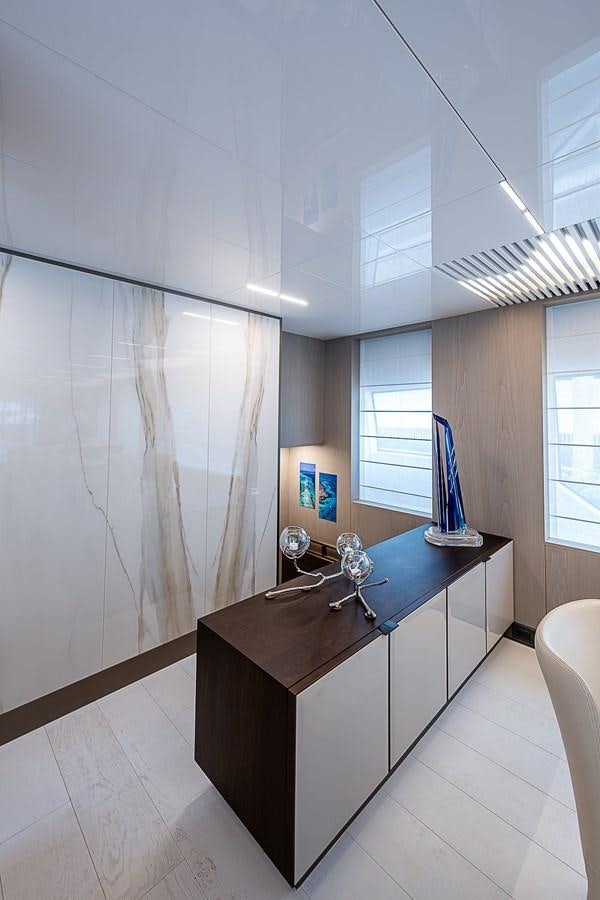 a room with a desk and a window aboard DANDY 2021 FERRETTI 850 @ AVENTURA Yacht for Sale