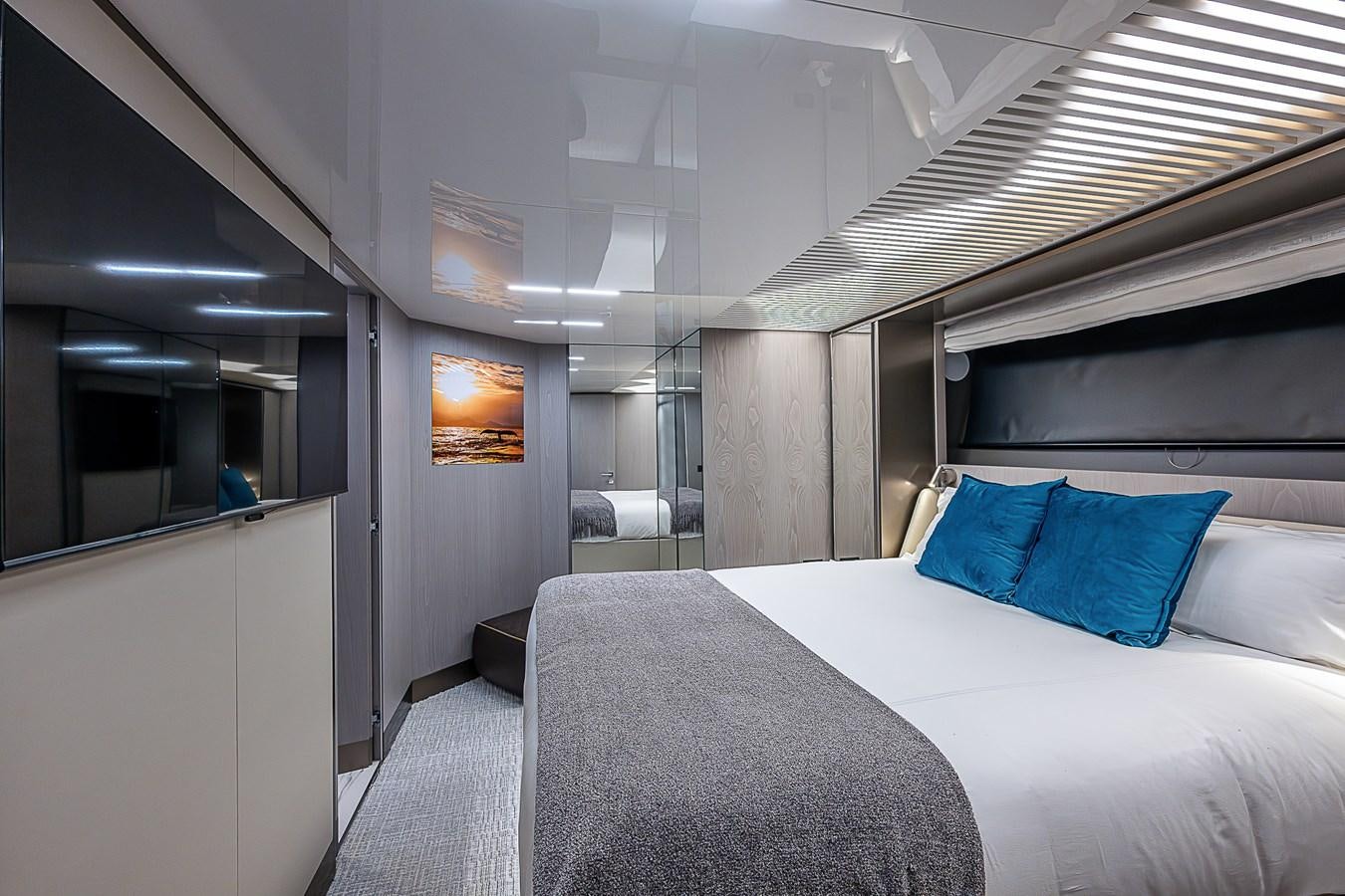 a room with a bed and a white bed aboard DANDY 2021 FERRETTI 850 @ AVENTURA Yacht for Sale