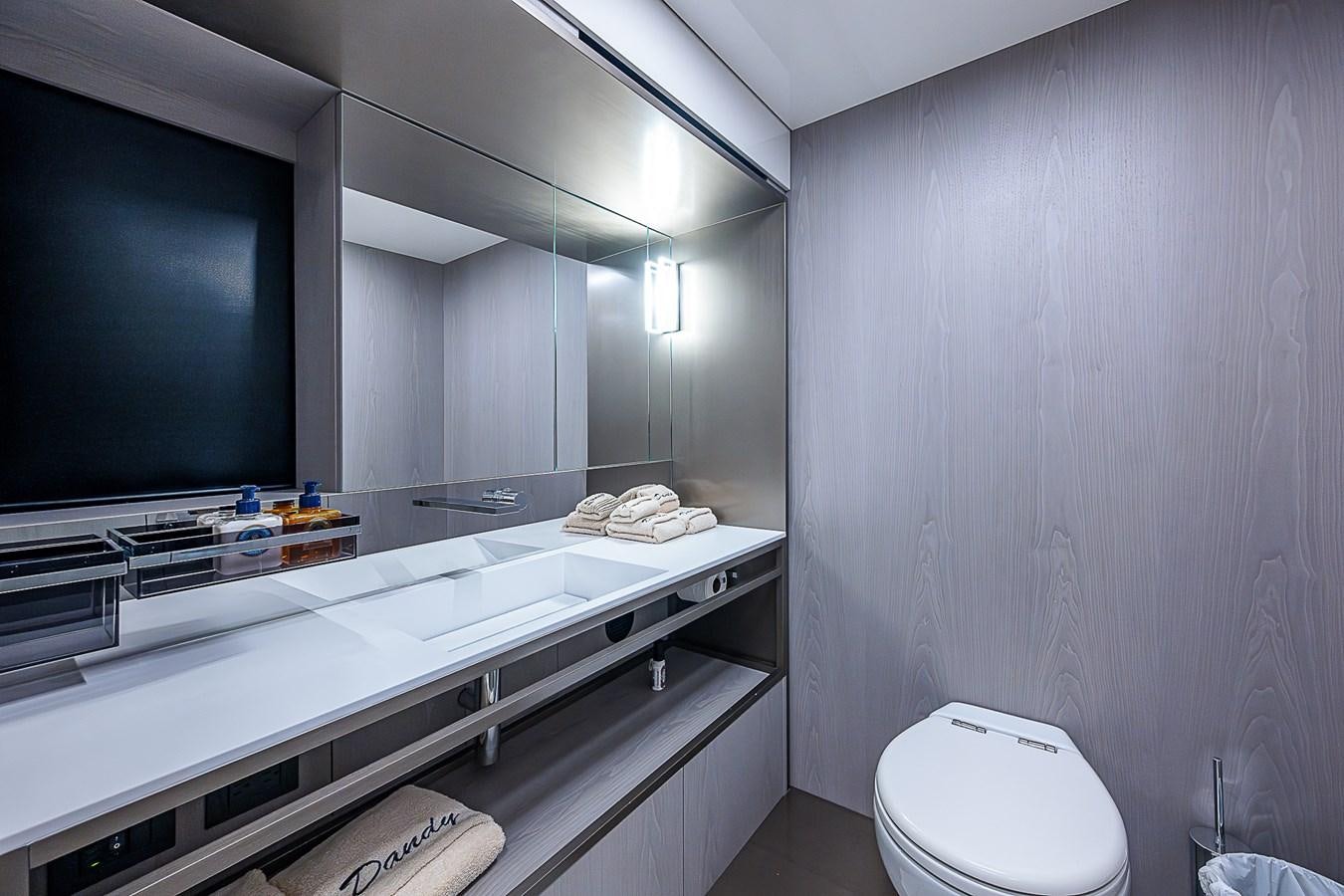 a bathroom with a large mirror aboard DANDY 2021 FERRETTI 850 @ AVENTURA Yacht for Sale