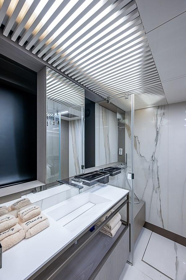 a bathroom with a large window aboard DANDY 2021 FERRETTI 850 @ AVENTURA Yacht for Sale
