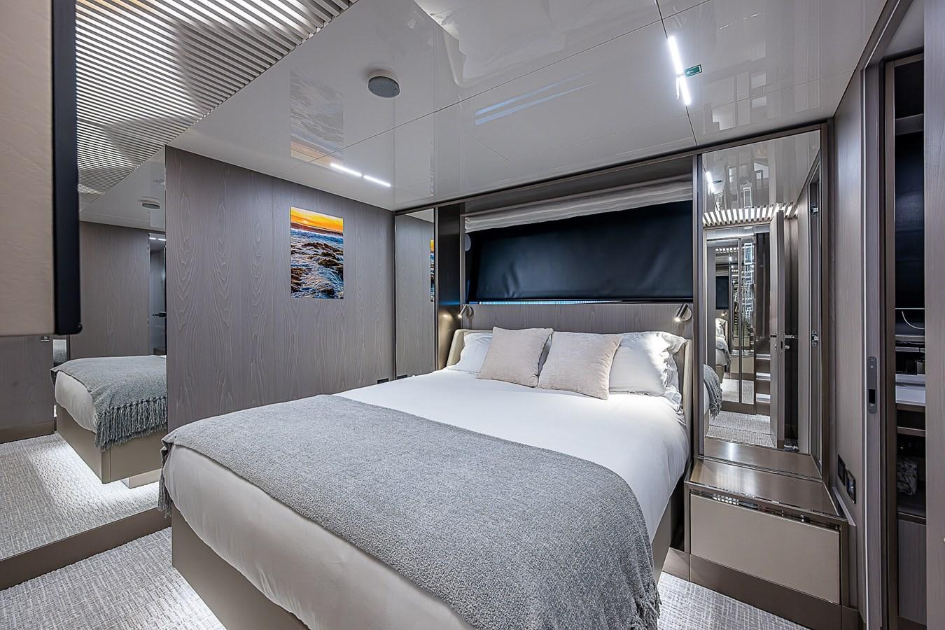 a bed in a room aboard DANDY 2021 FERRETTI 850 @ AVENTURA Yacht for Sale