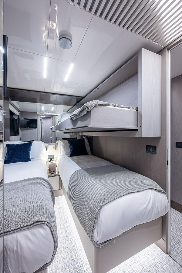 a room with two beds aboard DANDY 2021 FERRETTI 850 @ AVENTURA Yacht for Sale