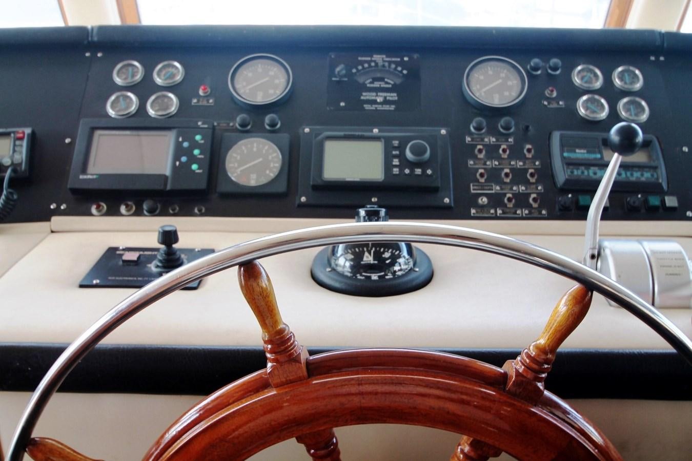 a violin on a seat aboard ENCHANTRESS Yacht for Sale