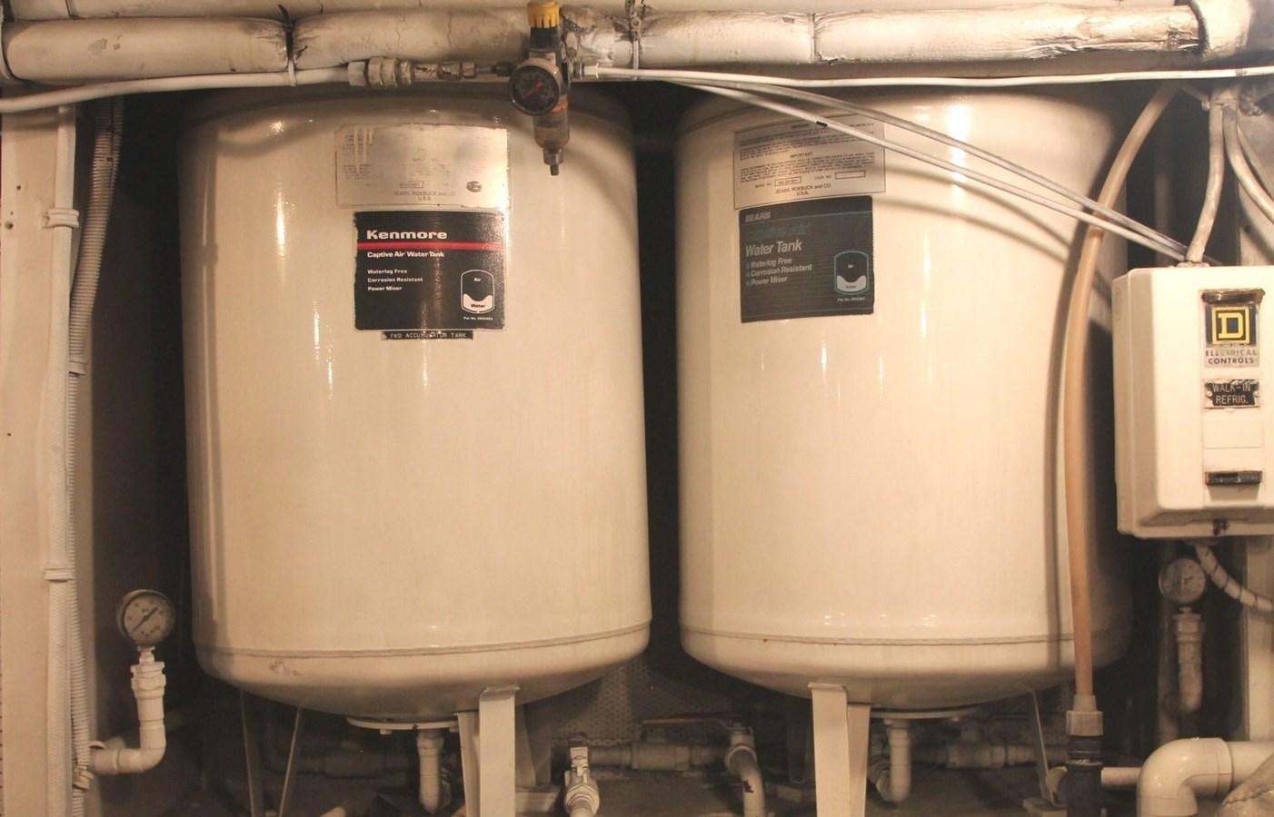 a couple of white toilets aboard ENCHANTRESS Yacht for Sale