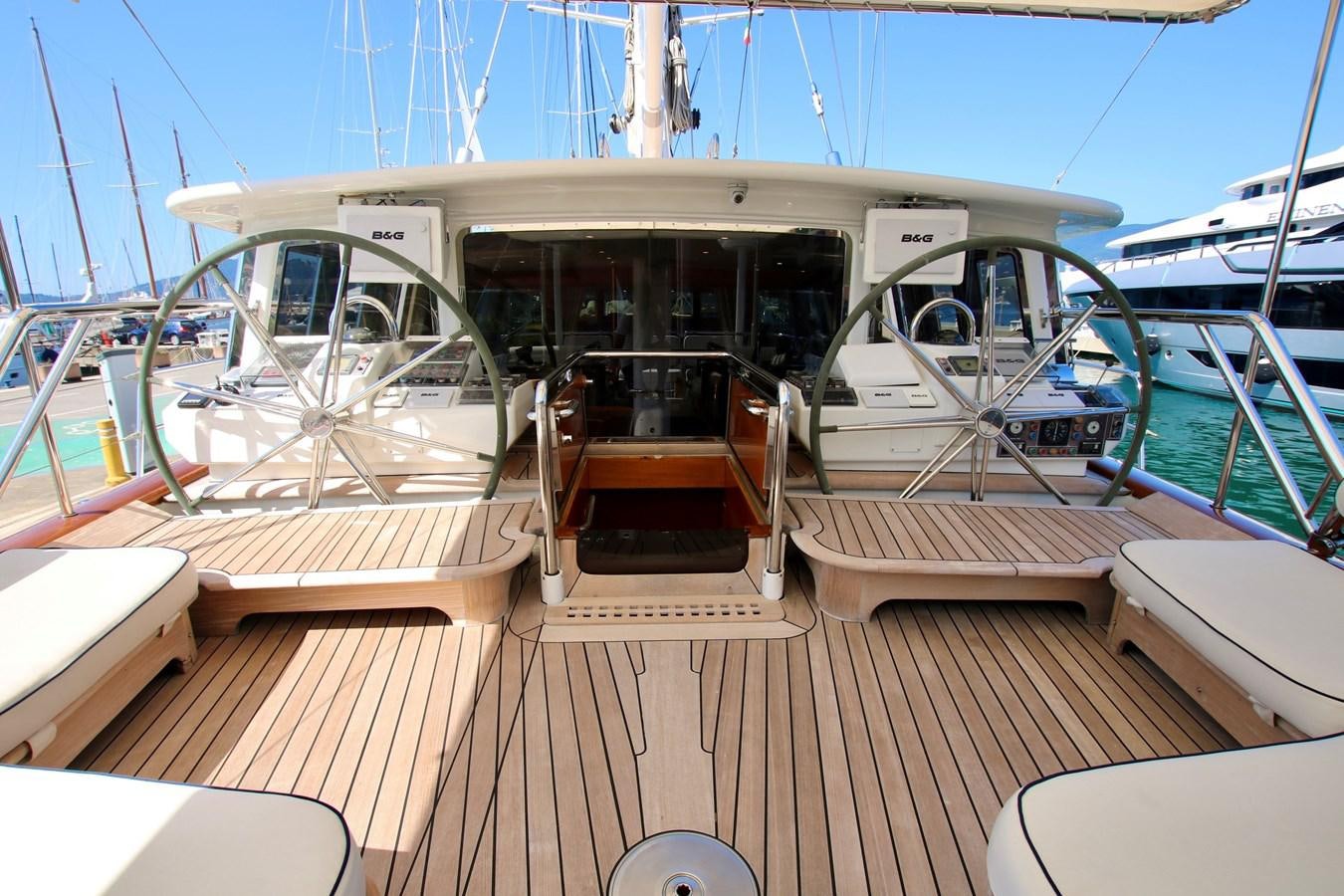 a boat on a deck aboard CYRANO DE BERGERAC Yacht for Sale