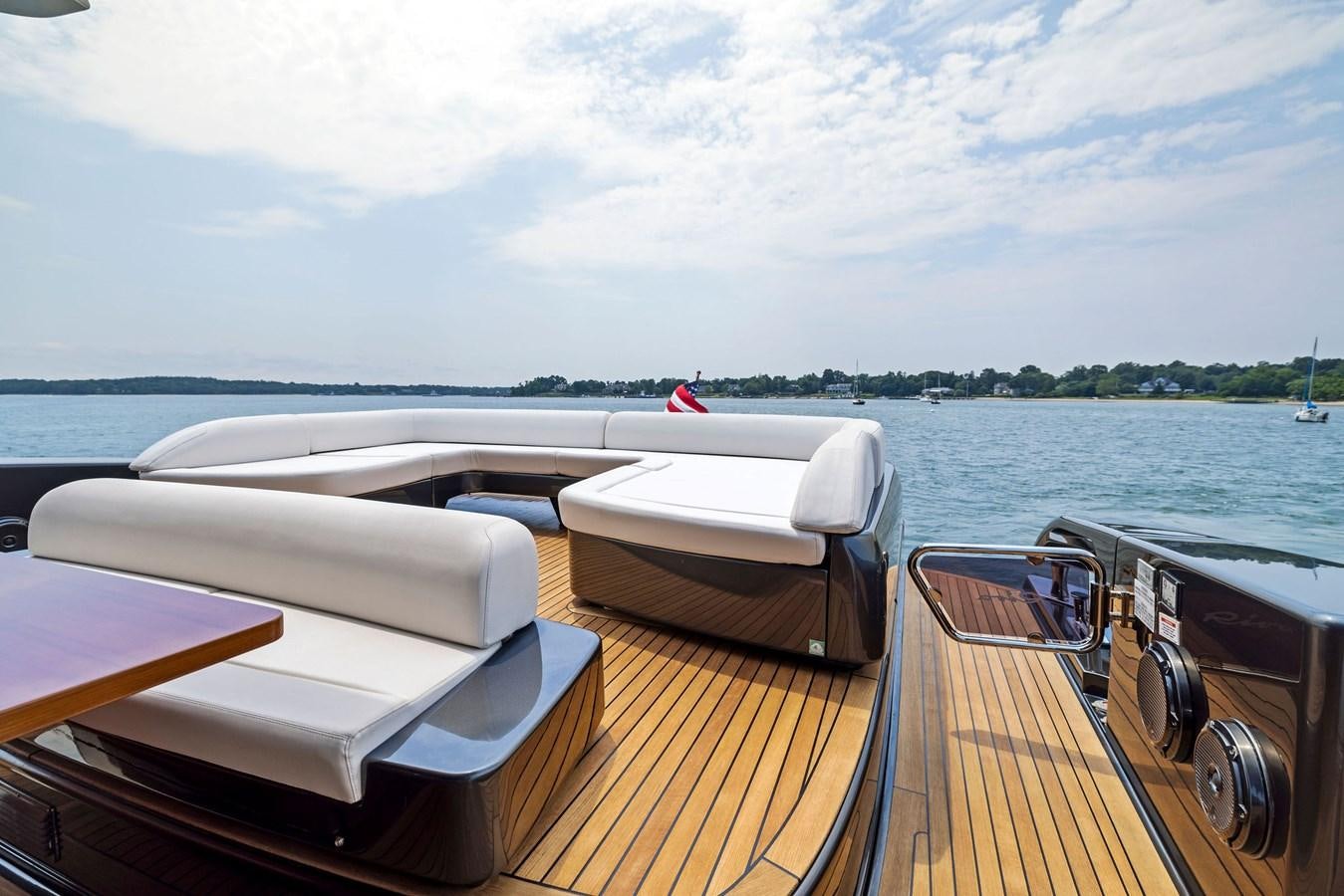 a boat on a deck aboard INDISCRETION Yacht for Sale