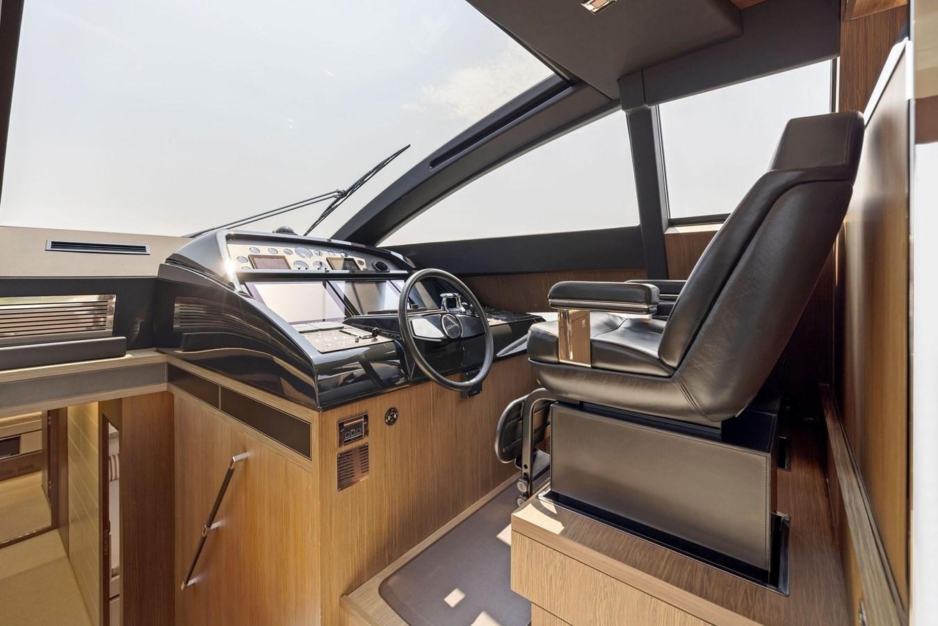 the inside of a car aboard INDISCRETION Yacht for Sale