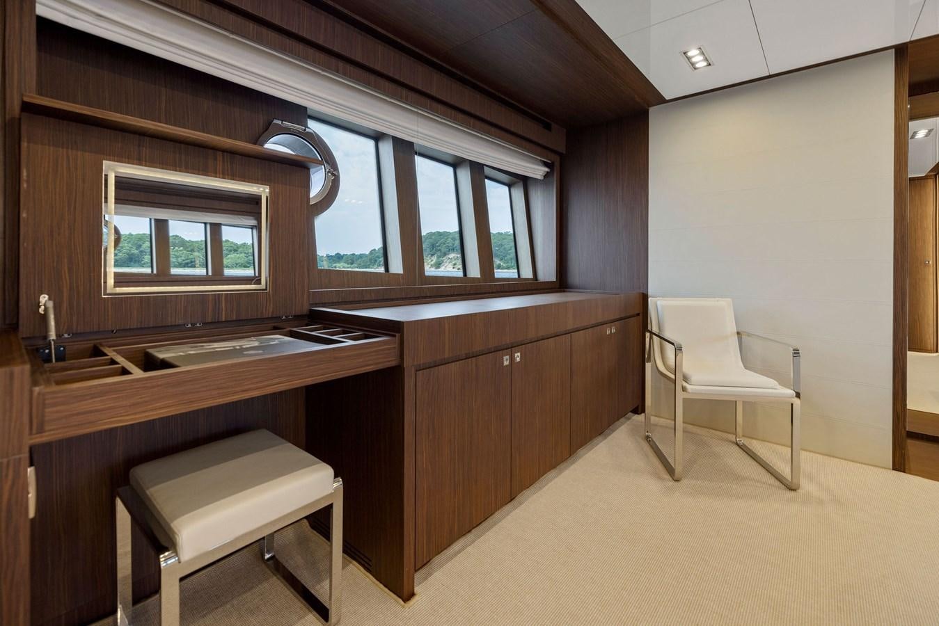 a room with a desk and chairs aboard INDISCRETION Yacht for Sale