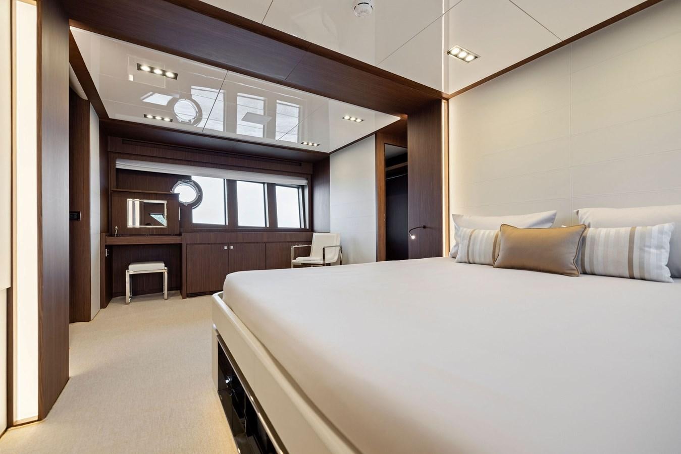 a bed in a room aboard INDISCRETION Yacht for Sale