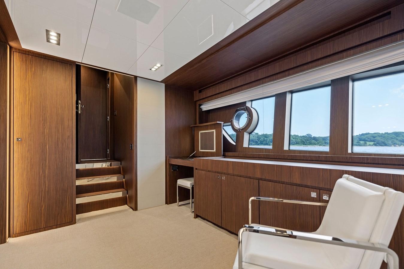 a room with a chair and a desk aboard INDISCRETION Yacht for Sale