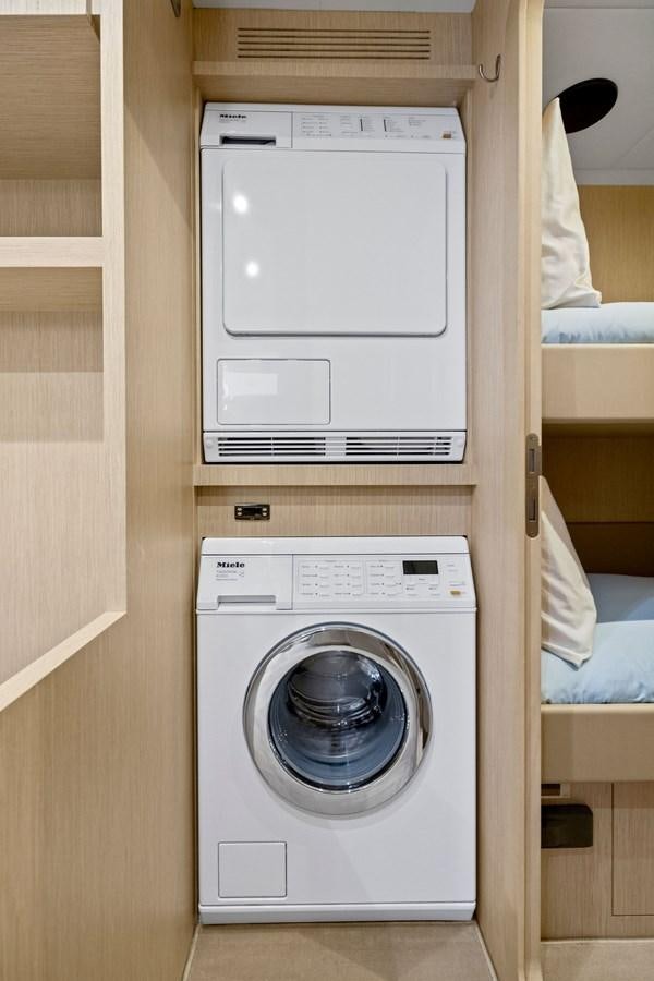 a white washing machine aboard INDISCRETION Yacht for Sale