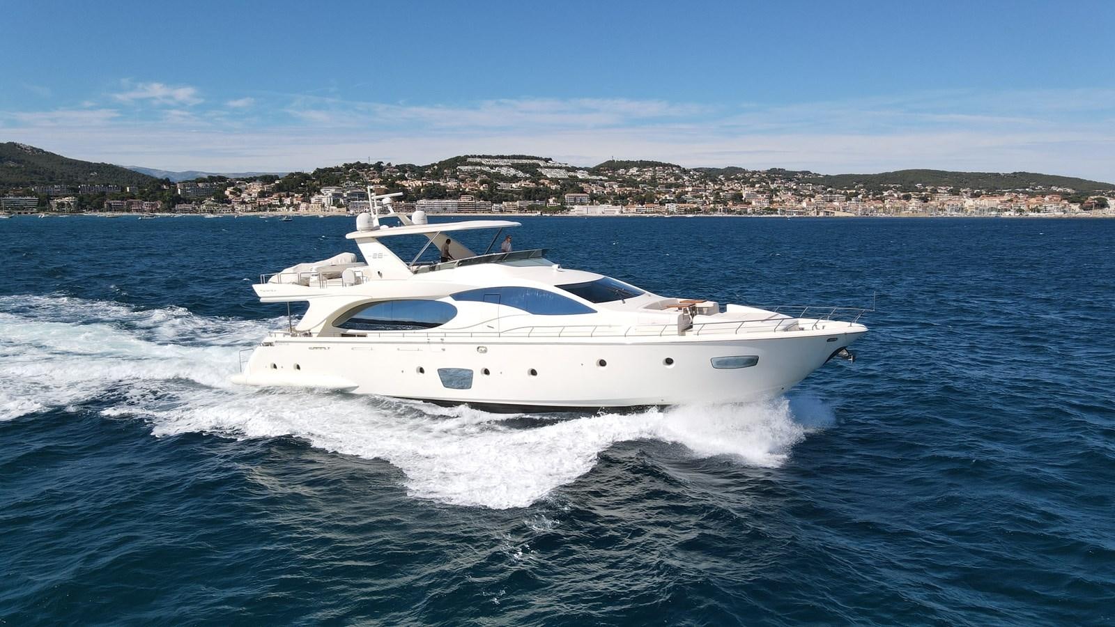 a white yacht on the water aboard EVA Yacht for Sale