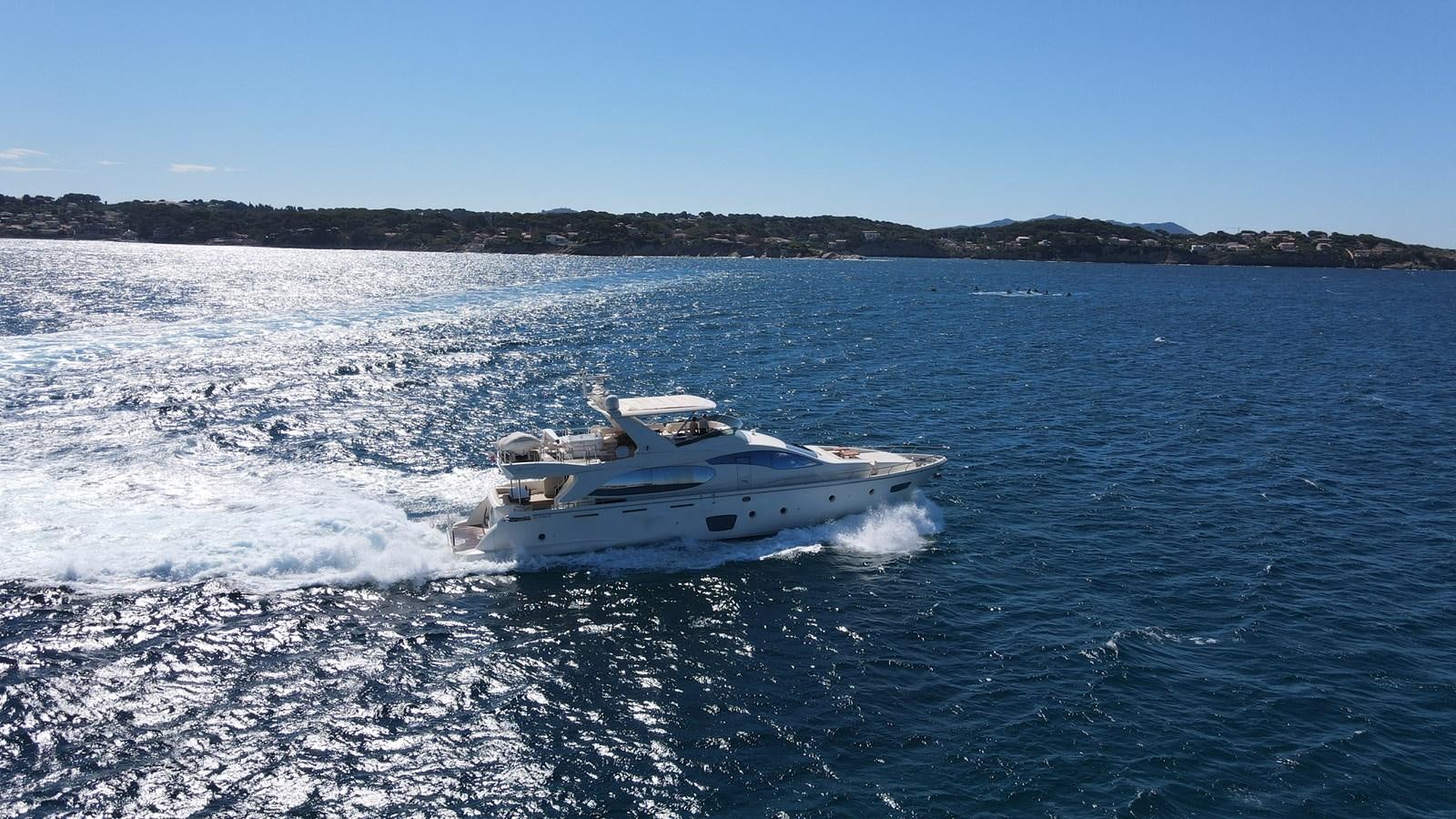 a boat driving on water aboard EVA Yacht for Sale