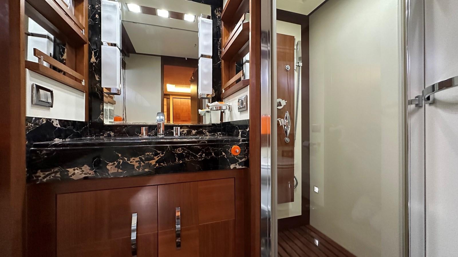a kitchen with a stove and cabinets aboard EVA Yacht for Sale