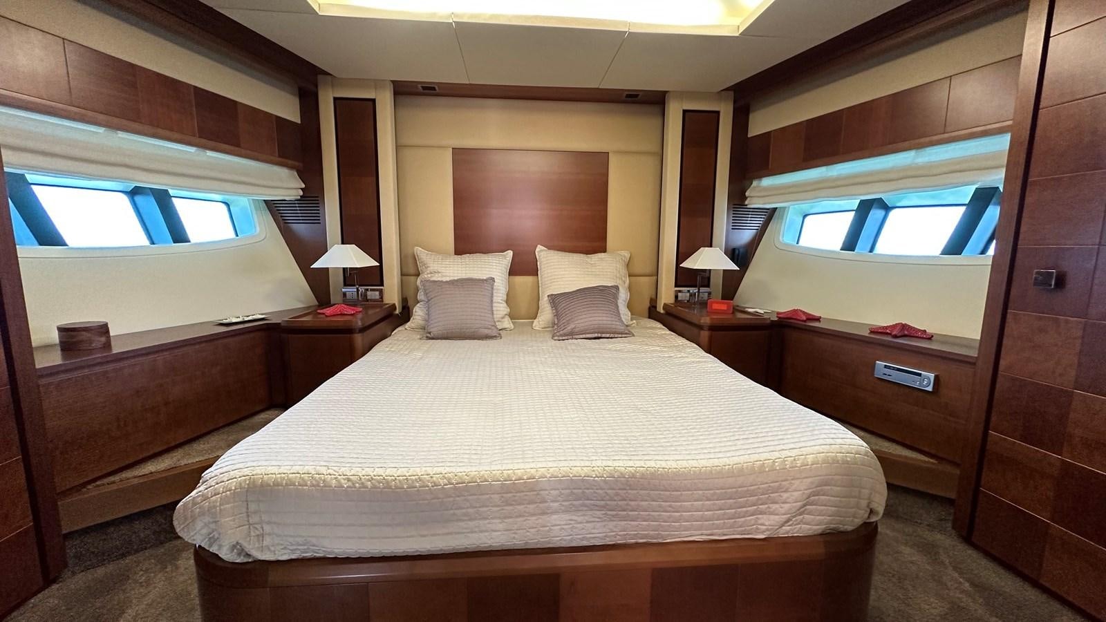 a hotel room with a bed aboard EVA Yacht for Sale
