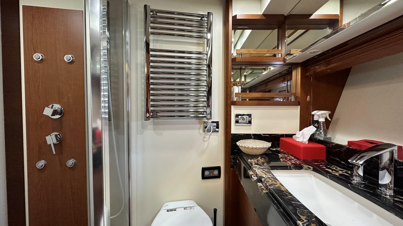 a kitchen with a sink and a stove aboard EVA Yacht for Sale