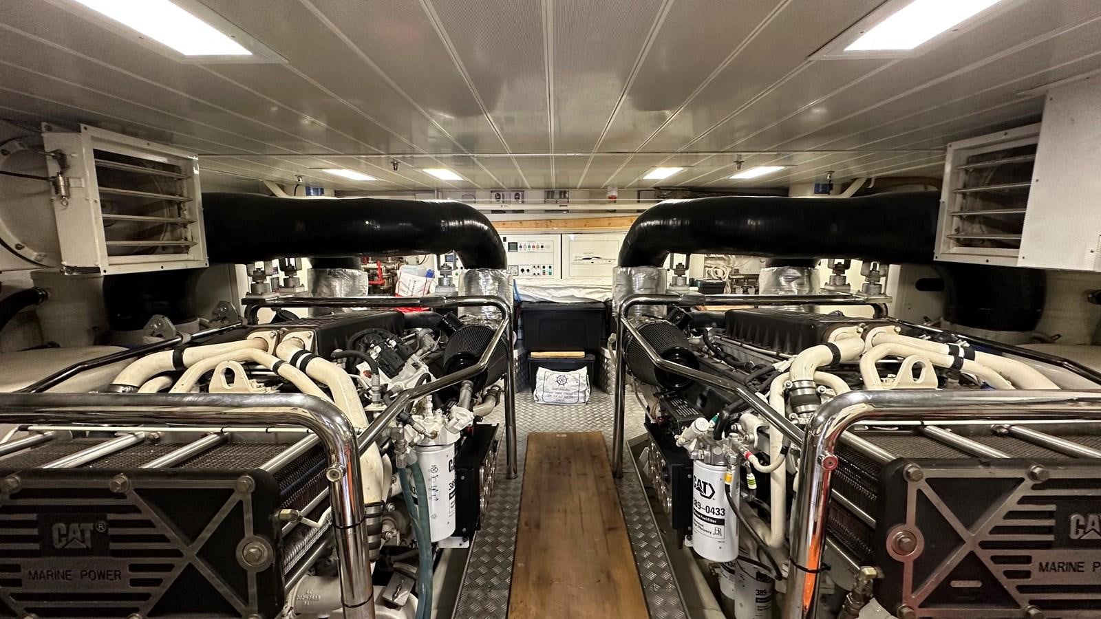 a large room with machinery with California State Railroad Museum in the background aboard EVA Yacht for Sale