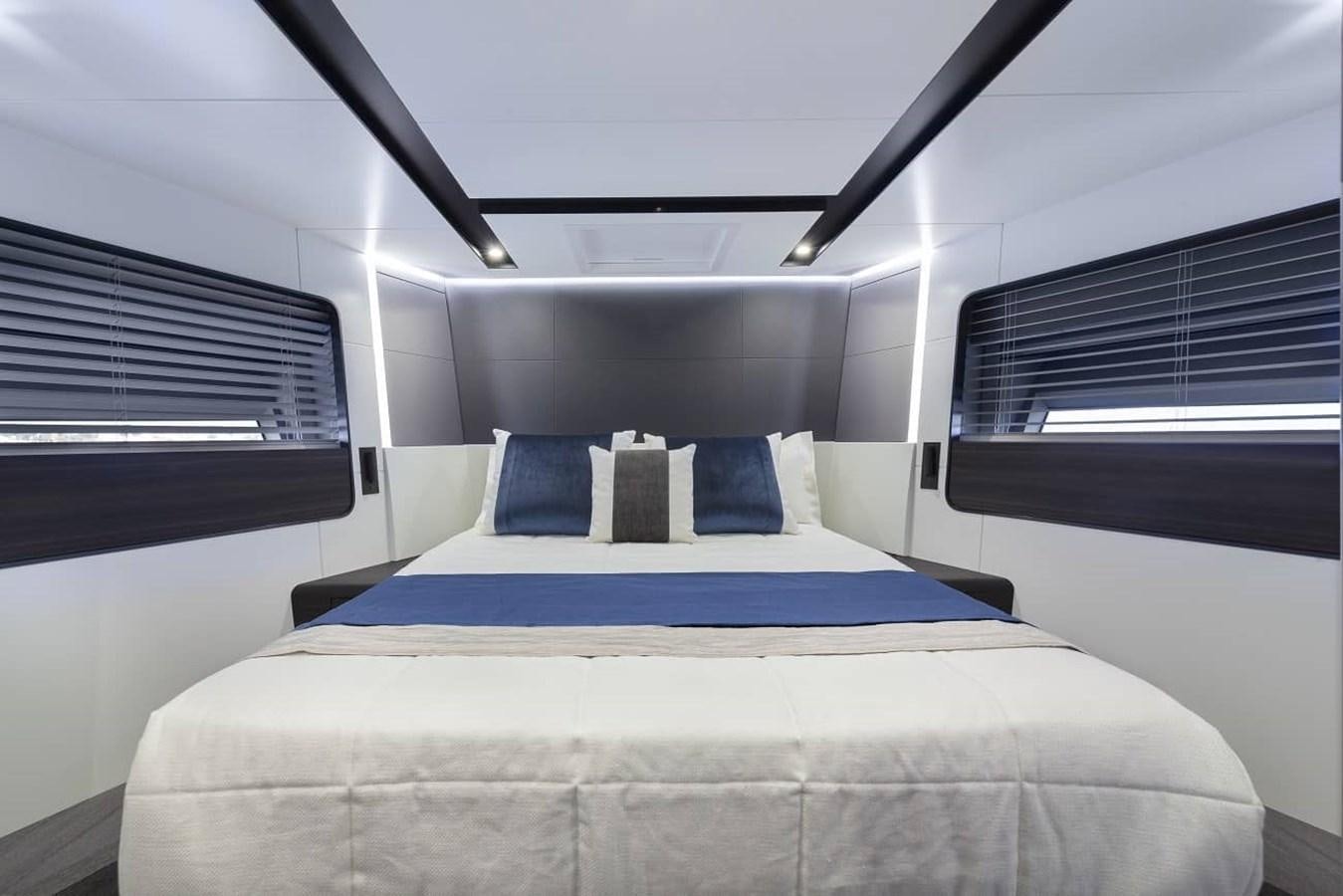a bed in a room aboard ASTO82AS8724 Yacht for Sale