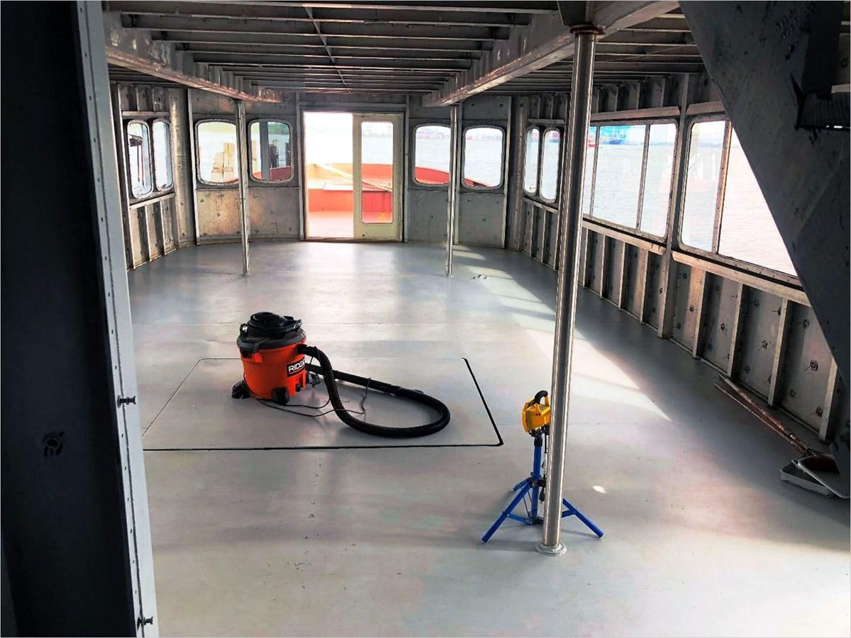 a room with a vacuum aboard SEA MONSTER Yacht for Sale