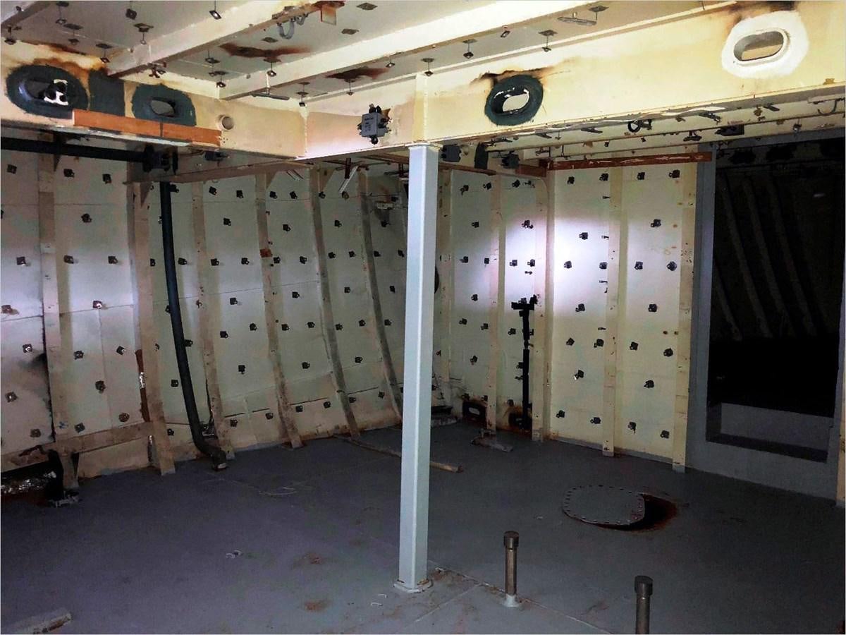 a room with pipes and equipment aboard SEA MONSTER Yacht for Sale