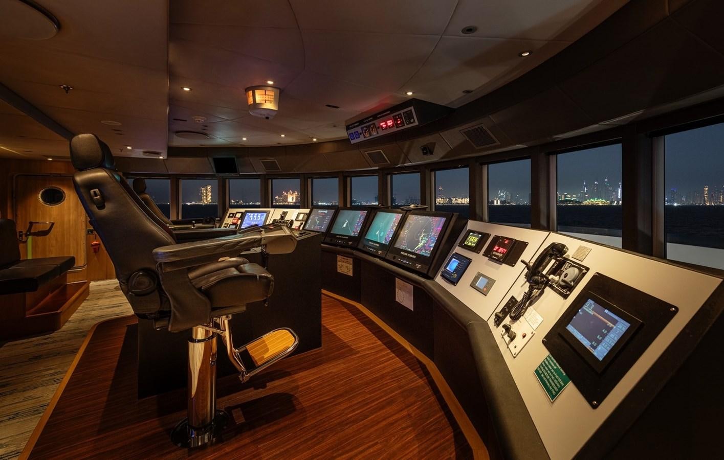 a room with a desk and computer aboard MOONLIGHT II Yacht for Sale