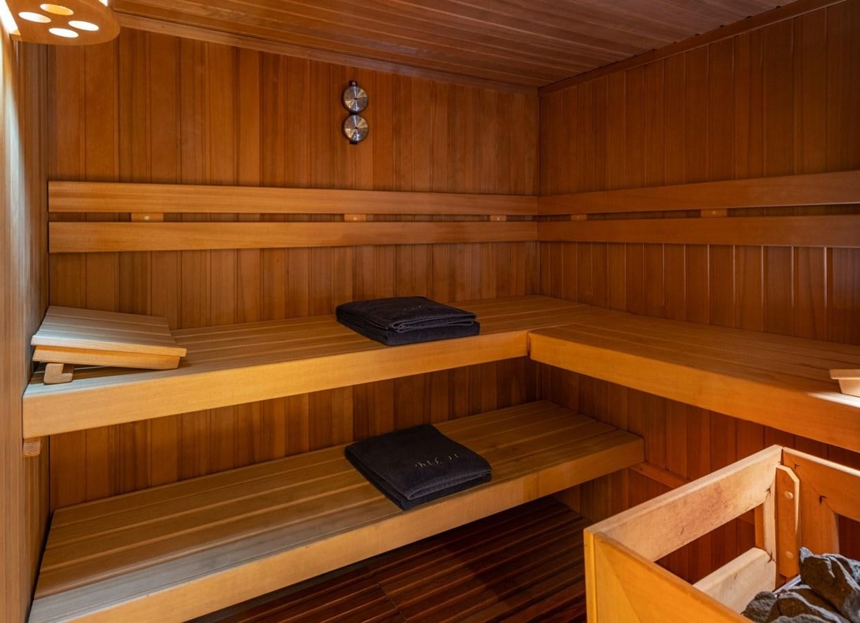 a desk with a laptop on it aboard MOONLIGHT II Yacht for Sale