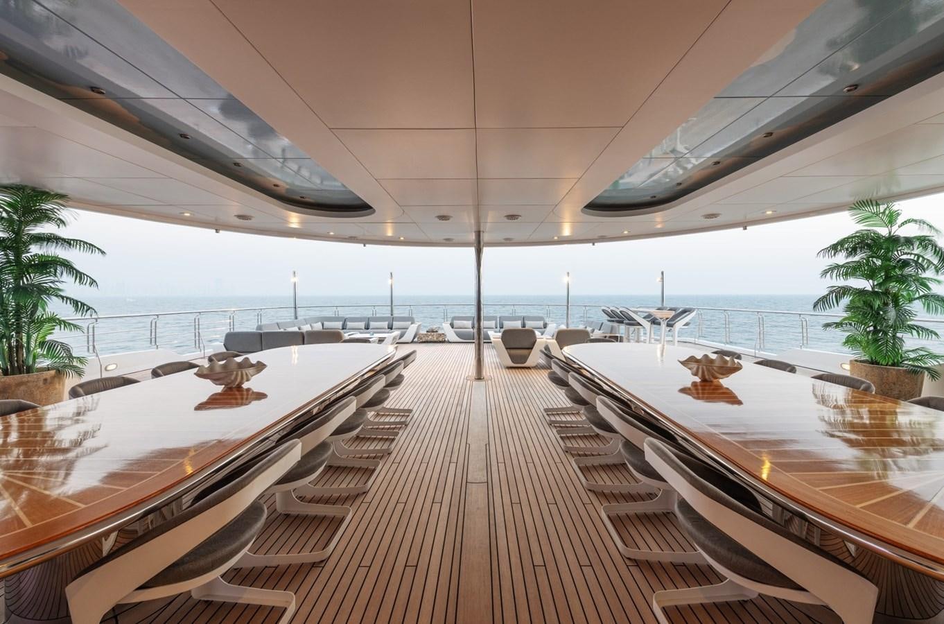 a deck with a large deck overlooking the ocean aboard MOONLIGHT II Yacht for Sale