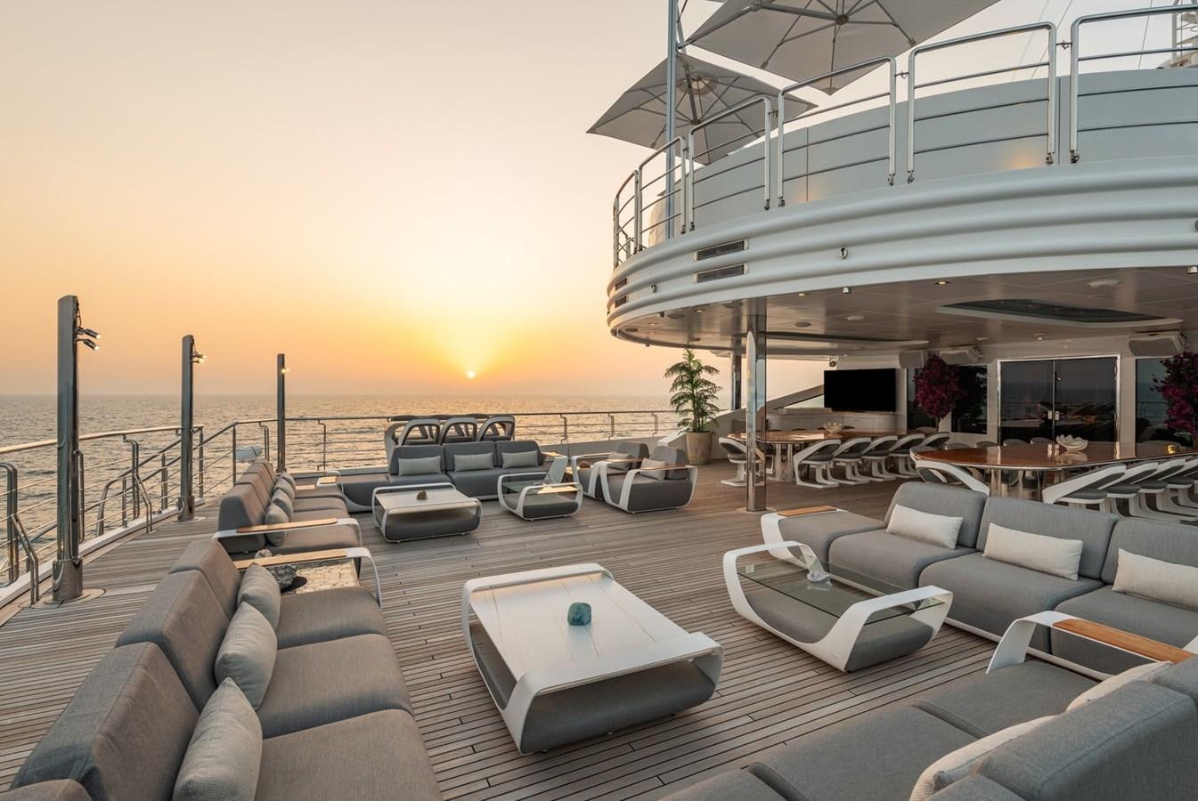 a large lounge area with a pool aboard MOONLIGHT II Yacht for Sale
