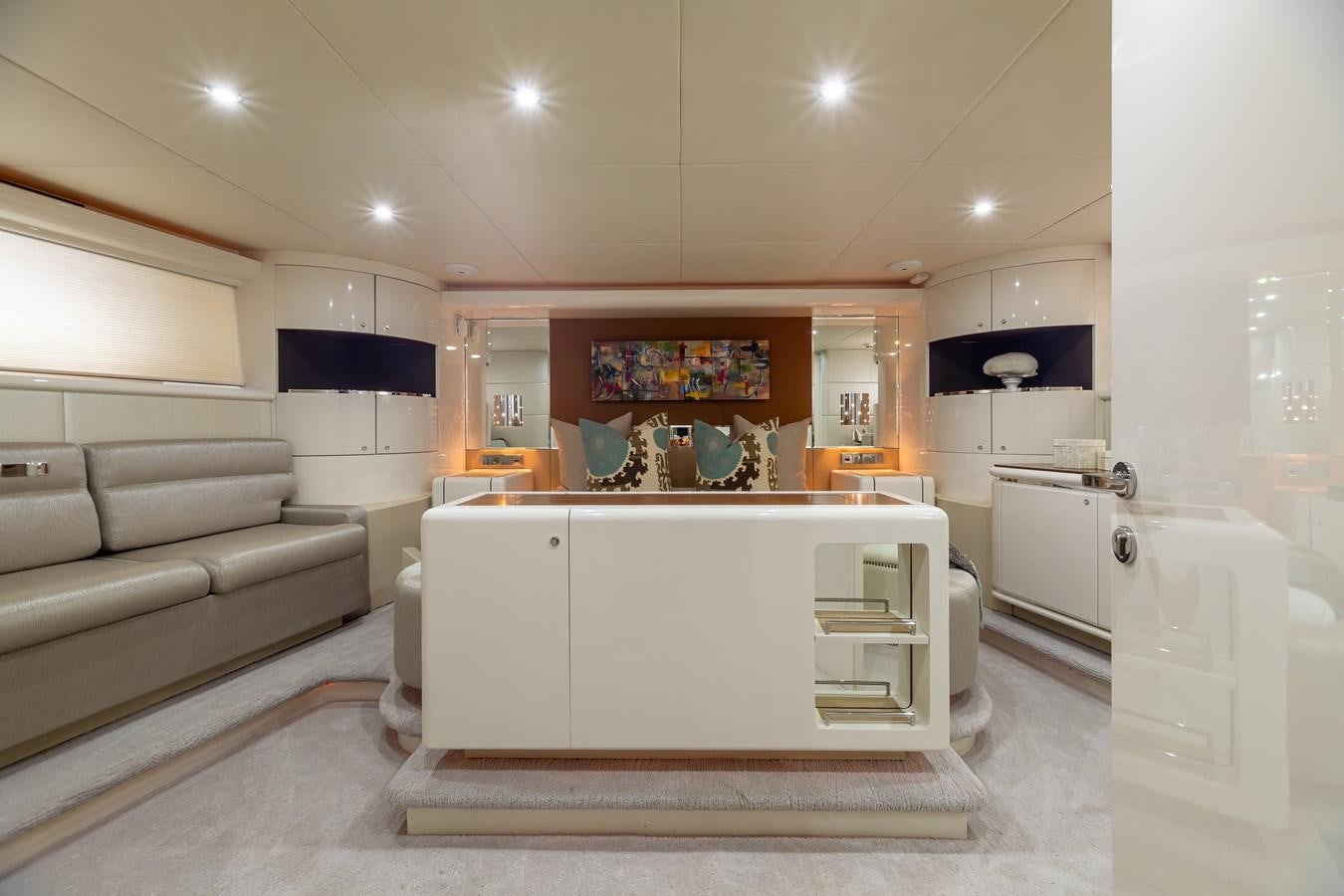 a kitchen with a white island aboard GRANDEUR Yacht for Sale