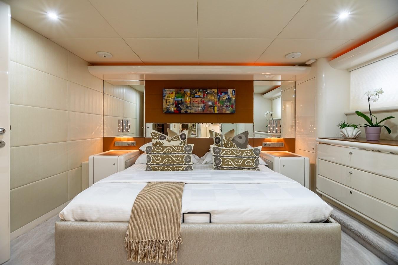 a large bed in a room aboard GRANDEUR Yacht for Sale