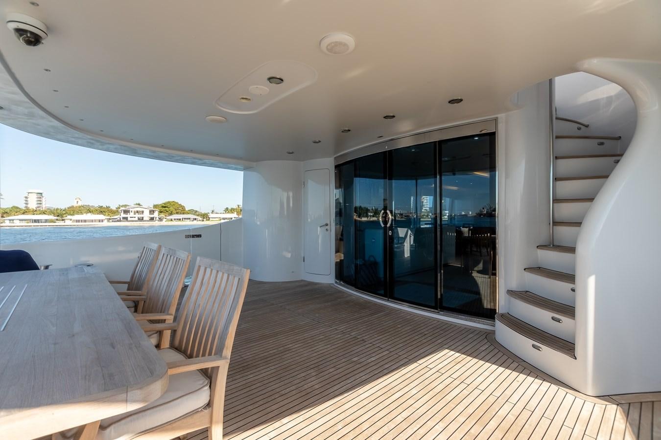 a room with a table and chairs aboard GRANDEUR Yacht for Sale