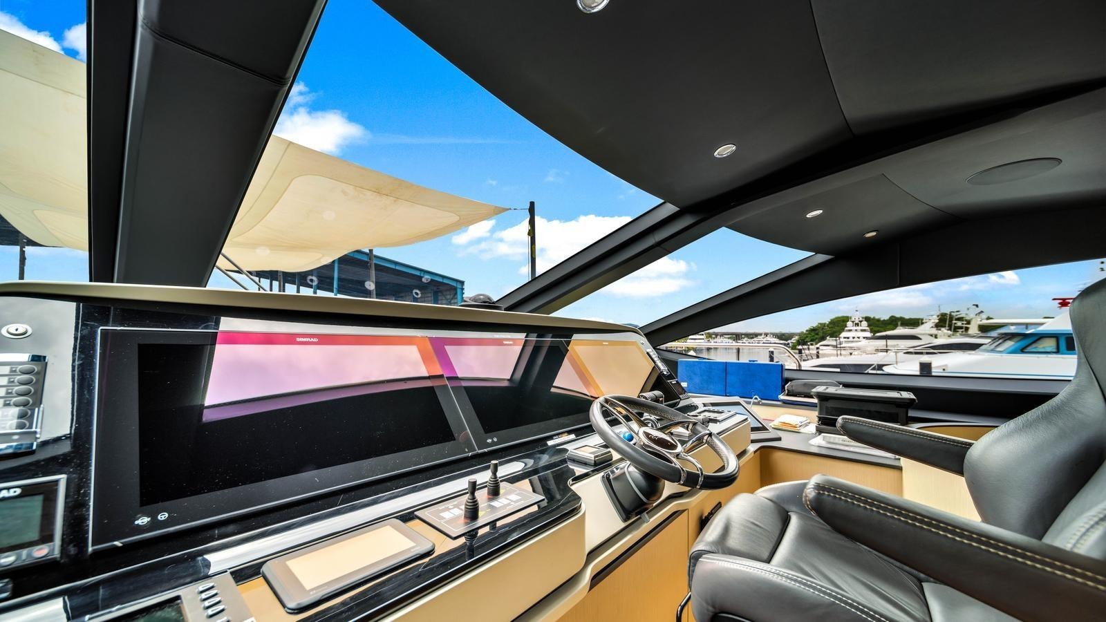inside of a car aboard ONE & ONLY Yacht for Sale